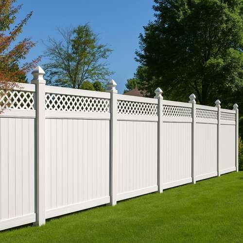 Pretty white vinyl fence with lattice on top in a yard in Camas.