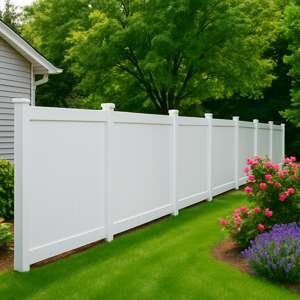 Vinyl Fence Installtion In Camas, Wa. Beautiful white vinyl fence with trees and shrubs installed in Camas, Wa.